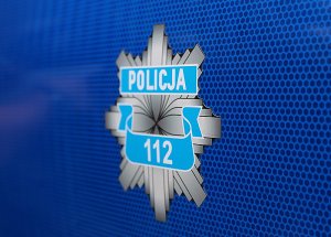 Identyfikator policyjny z napisem &quot;policja 112&quot; na niebieskim tle.